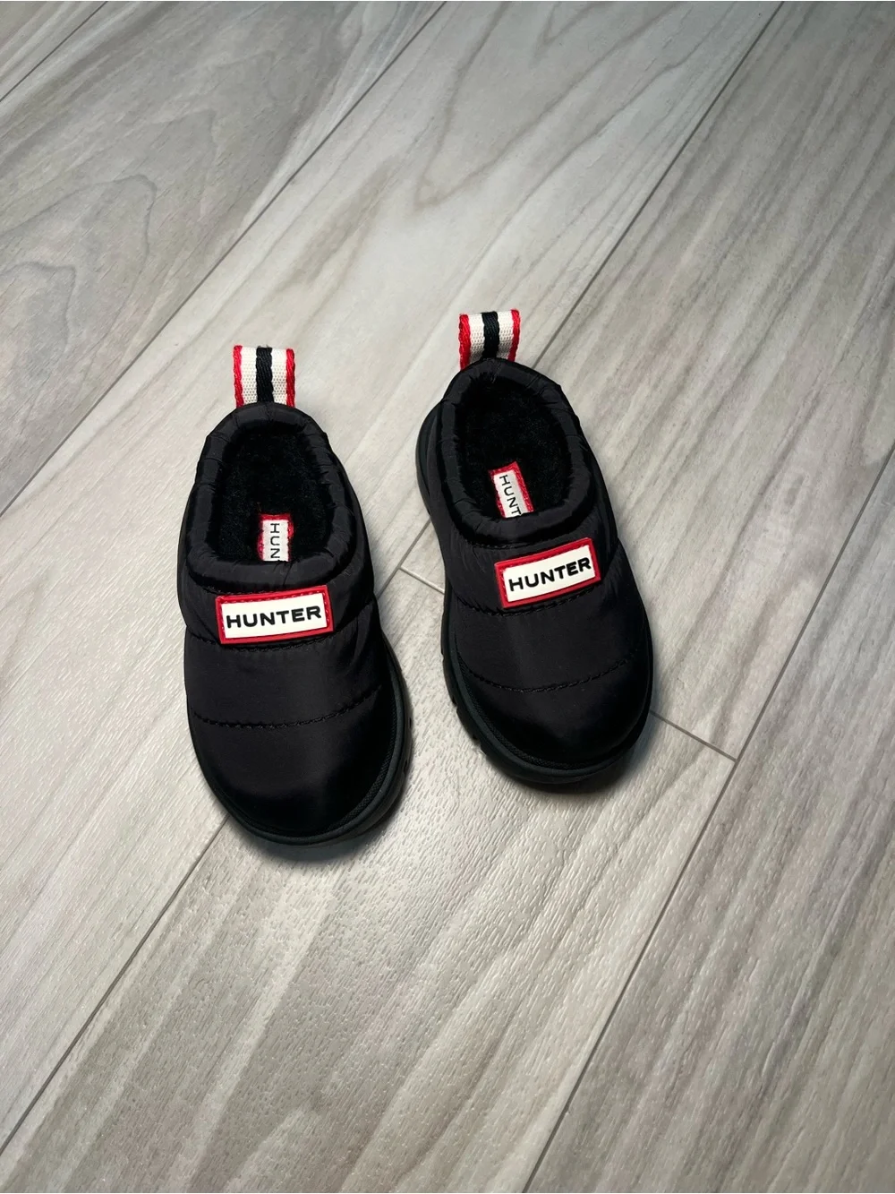 NWOT Hunter Kids Black Slip-On Puff Shoes with Red-Trim Logo